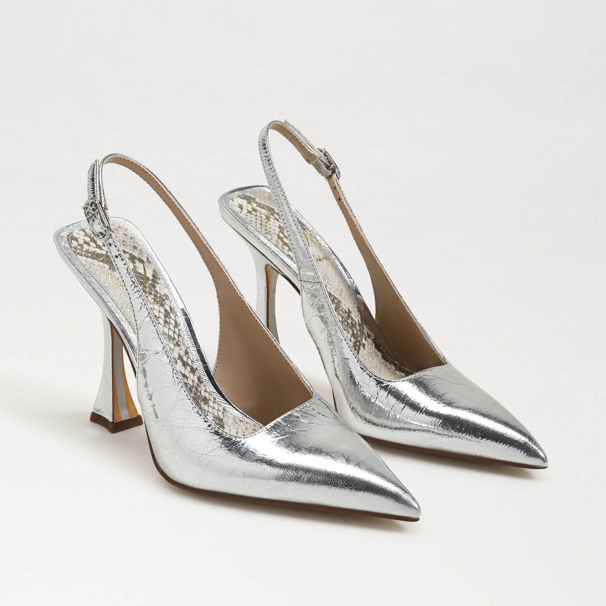 Famous footwear silver heels on sale